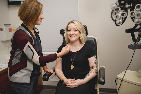 Woman having her eyes examined