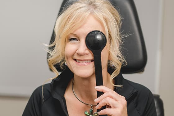 Woman taking cornea test