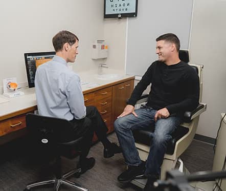 eye doctor with lasik patient 