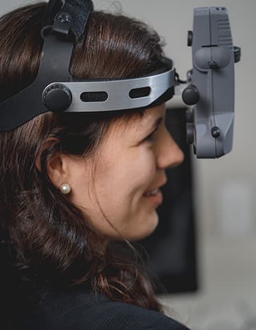 Woman taking eye test