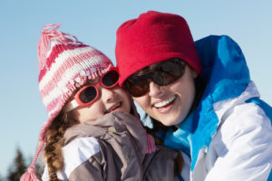 Mom and Daughter wearing sunglasses